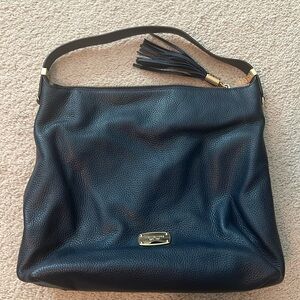 Michael Kors navy blue purse. Pebbled leather. Used a few times.